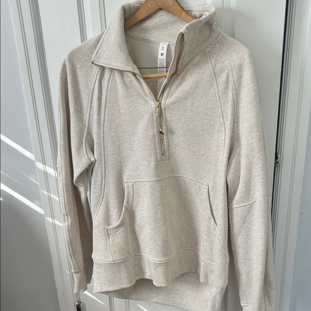 Lulu Lemon Cream Quarter-Zip Pullover with Gold accents.  NWOT. M/L.